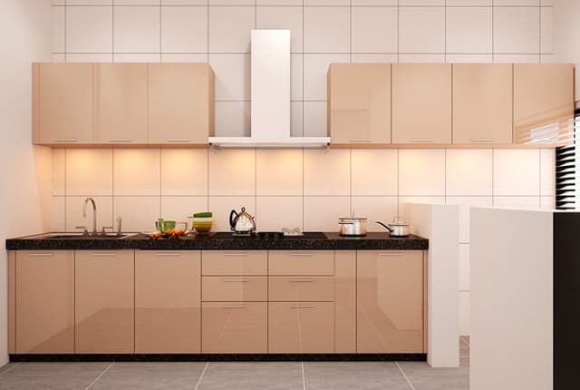 The Kitchen having Black Granite Linear Countertop with Built-In Gas Stove, Chimney & Single Bowl S.S. Sink is Looking Classy with Peach Colour Cabinets The Kitchen having Black Granite Linear Countertop with Built-In Gas Stove, Chimney & Single Bowl S.S. Sink is Looking Classy with Peach Colour Cabinets