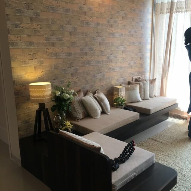 The L-Shape 6 Seater Wooden Sofa having Module of Two Beige Upholstered Seats The L-Shape 6 Seater Wooden Sofa having Module of Two Beige Upholstered Seats