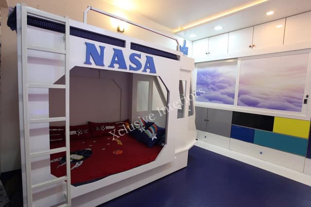 The Space Theme Bedroom with White Bunk Bed, Maroon & Blue Bedsheet with NASA is Connecting the Children with Their Dream The Space Theme Bedroom with White Bunk Bed, Maroon & Blue Bedsheet with NASA is Connecting the Children with Their Dream