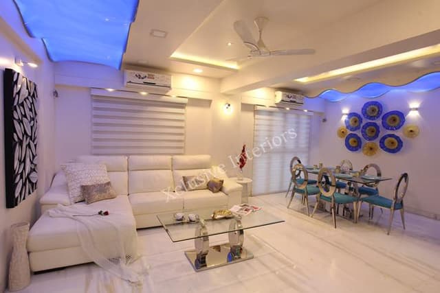 White themed Living Room consists of L Shape Sectional Sofa White themed Living Room consists of L Shape Sectional Sofa