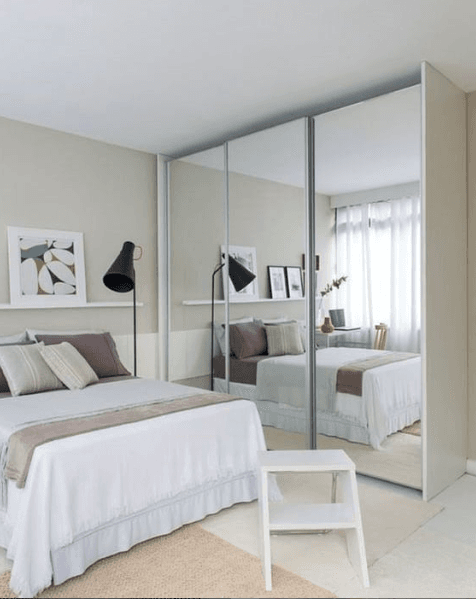 Modern Bedroom with White Bed &Pale Beige & Brown Cushions Modern Bedroom with White Bed &Pale Beige & Brown Cushions