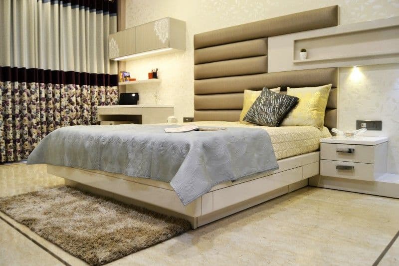 White Rectangular Bed having Beige Cushioned White Rectangular Bed having Beige Cushioned