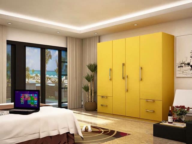 Room Bathes in a Creamy Warmth, Accentuated by a False Ceiling Room Bathes in a Creamy Warmth, Accentuated by a False Ceiling