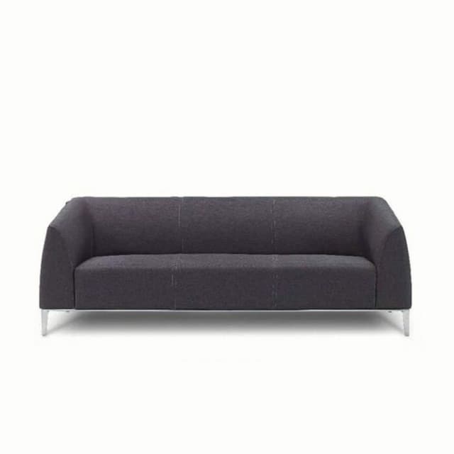 Chic-Modern Living Room a Plush Grey Three-Seater Sofa Chic-Modern Living Room a Plush Grey Three-Seater Sofa