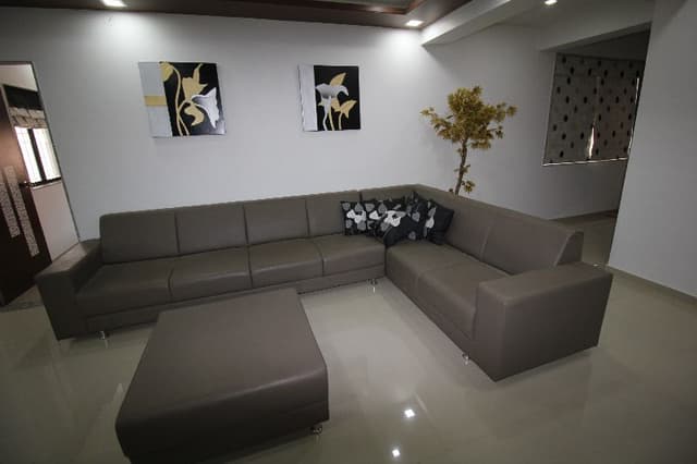 L – Shaped Equi-Length Sofa Placed in a White-Themed Modern Living Room L - Shaped Equi-Length Sofa Placed in a White-Themed Modern Living Room