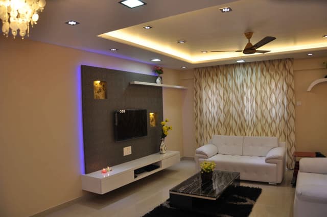 Modern Well-Illuminated Living Room Characterized by Beige Walls Modern Well-Illuminated Living Room Characterized by Beige Walls