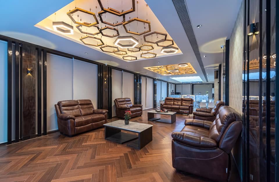 Rustic Extended Living Area with Wooden Herringbone Flooring Rustic Extended Living Area