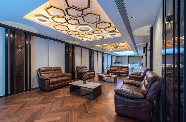 Rustic Extended Living Area with Wooden Herringbone Flooring Rustic Extended Living Area