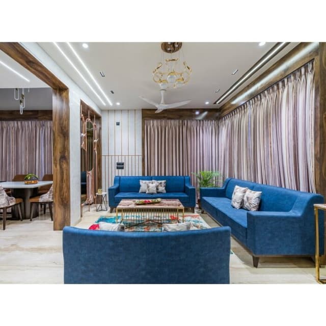 Spacious and Luxurious Living Room Featuring Light Blue Sofas Spacious and Luxurious Living Room Featuring Light Blue Sofas