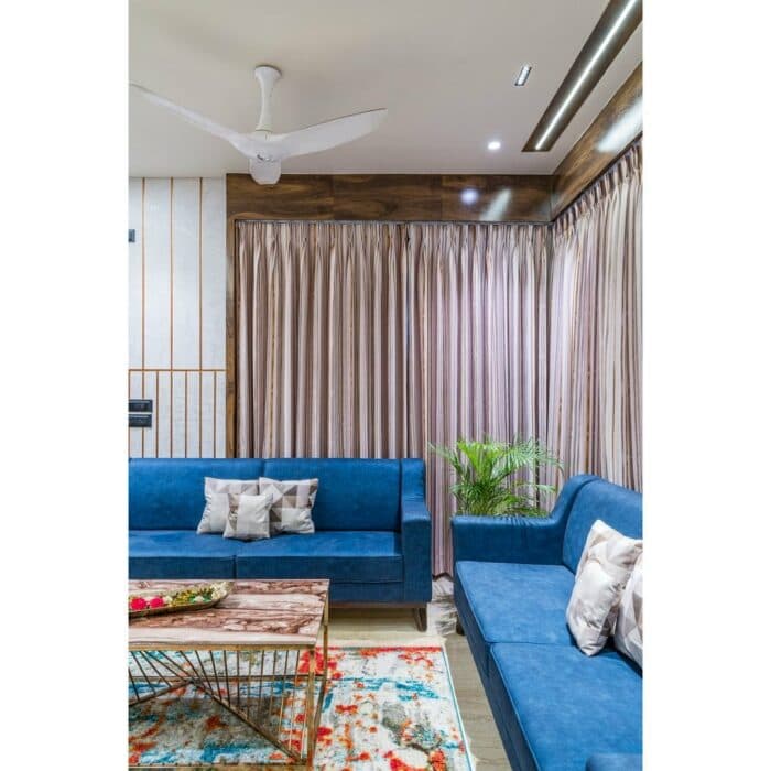 Spacious and Luxurious Living Room Featuring Light Blue Sofas Spacious and Luxurious Living Room Featuring Light Blue Sofas