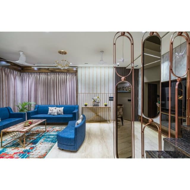 Spacious and Luxurious Living Room Featuring Light Blue Sofas Spacious and Luxurious Living Room Featuring Light Blue Sofas