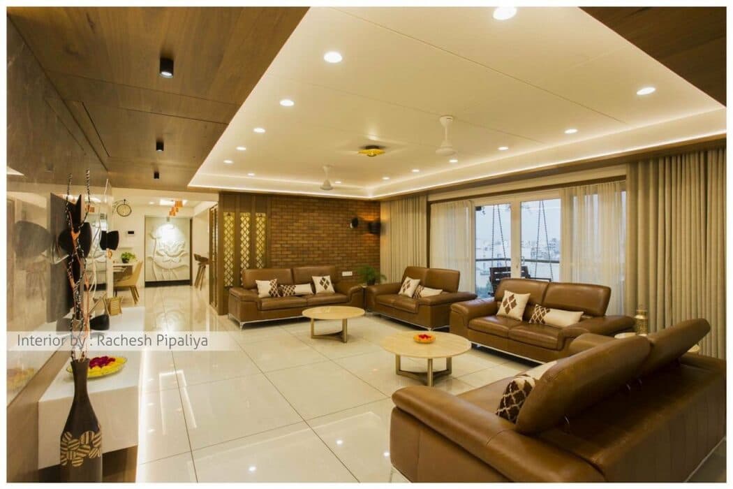 Spacious Living Room with High Ceilings Spacious Living Room with High Ceilings and Predominantly White Decor