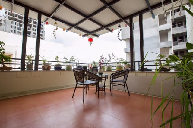 Beautifully Designed Balcony with an Open Yet Cozy Ambiance Beautifully Designed Balcony with an Open Yet Cozy Ambiance